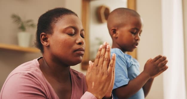 Mother and child praying